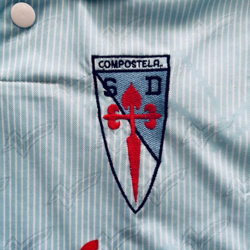 compostela home kit 1994 1995 crest white ligh blue