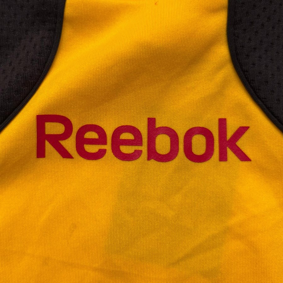 rc-lens-reebok-home-jersey-2010-2011-logo